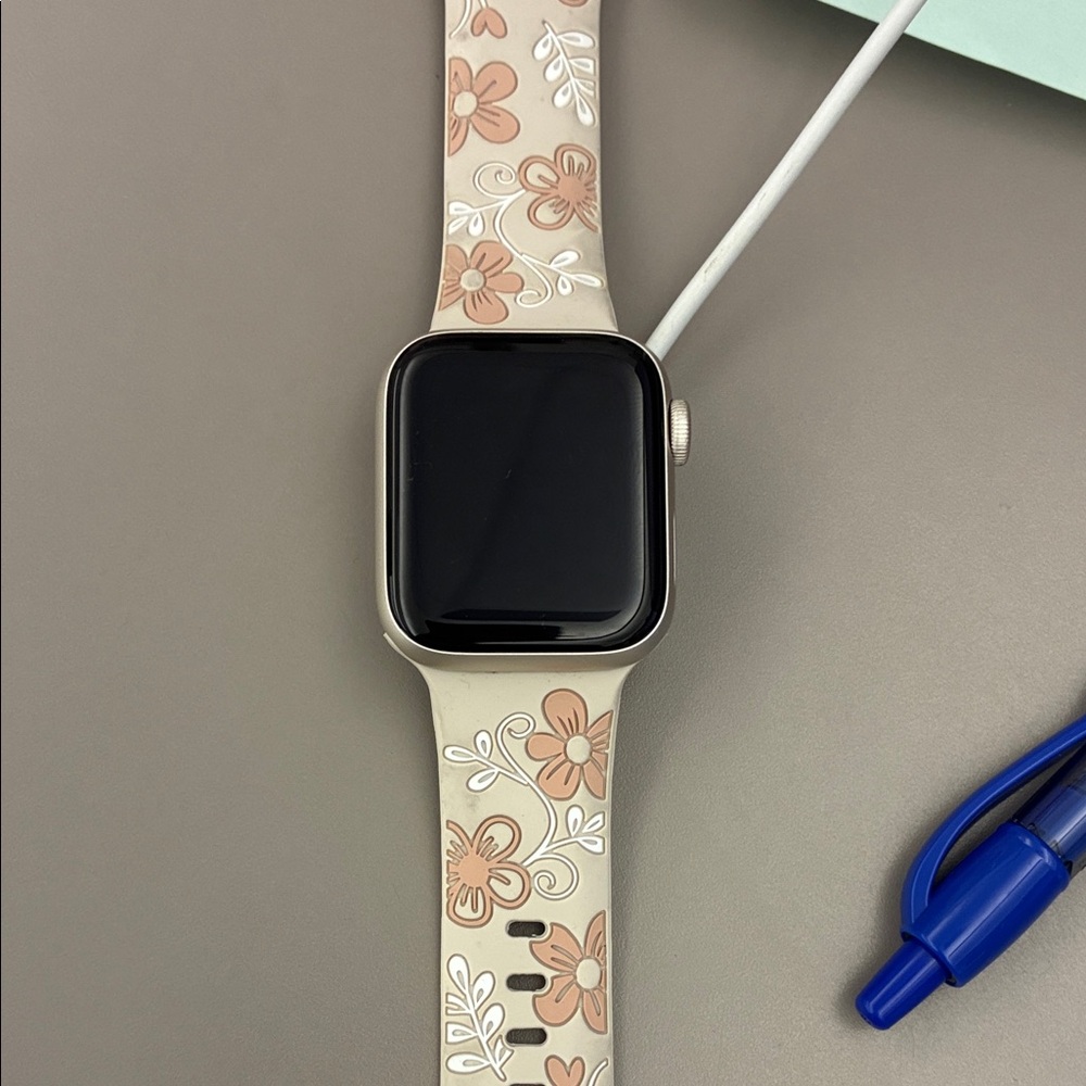Silver Apple Watch with Beige Floral Silicone Band - Compatible Wearable